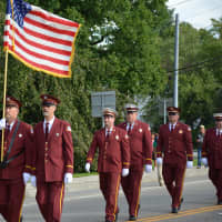 <p>Buchanan firefighters march in the Carmel Fire Department&#x27;s 100th anniversary parade.</p>