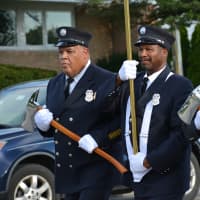 <p>Bedford Hills firefighters march in the Carmel Fire Department&#x27;s 100th anniversary parade.</p>