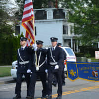 <p>Katonah firefighters march in the Carmel Fire Department&#x27;s 100th anniversary parade.</p>