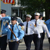<p>Putnam Valley firefighters march in the Carmel Fire Department&#x27;s 100th anniversary parade.</p>