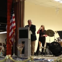 <p>Tuckahoe Mayor Steve Ecklond spoke to the crowd Wednesday at the centennial celebration of the Tuckahoe Public Library.</p>