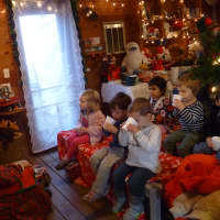 <p>Country Childrens Center executive director Polly Peace read &quot;The Polar Express&quot; while the children from the center&#x27;s Bedford Hills location enjoyed hot cocoa and cookies.</p>
