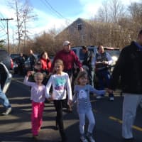 <p>Parents pick up their children from Sandy Hook Elementary School after a gunman shot and killed 26 children and adults there.</p>