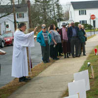 <p>Rev. Eric Hall dedicates the memorial garden for victims of Friday&#x27;s shooting at Sandy Hook Elementary School in Newtown, Conn. at Eastchester Community Church.</p>
