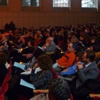 <p>The concert hall at Norwalk City Hall was filled Sunday afternoon at a vigil held to mourn those lost in the Sandy Hook Elementary School.</p>