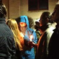 <p>People lined up outside Newtown High School, where President Barack Obama was meeting with first responders and families of the victims of the Sandy Hook Elementary School shooting.</p>