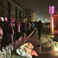 <p>People lined up outside Newtown High School on Sunday evening, hoping for a chance to hear President Barack Obama speak.</p>