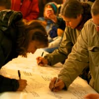 <p>Rye community members write their condolences for the victims of Friday&#x27;s shooting at Sandy Hook Elementary School in Newtown, Conn. and their families.</p>