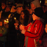 <p>A candlelight vigil is held on Fairfield&#x27;s Sherman Green on Monday in the memory of the 26 victims of last week&#x27;s shooting in a Newtown school.</p>