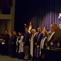 <p>Clergy from houses of worship from across Greenwich lead an interfaith prayer during Tuesday&#x27;s vigil for the Newtown shooting victims.</p>