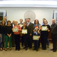 <p>At the Bedford board meeting Tuesday, Energize Bedford joined with the town to honor the 13 families who recently completed energy saving retrofits in their homes.</p>