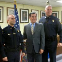 <p>The newly appointed sergeants, Steve Perrotta and Chris Broems, stand with Mayor Michael Pavia and Police Chief Jon Fontneau.</p>