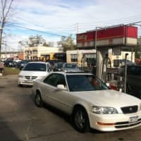 <p>The line of cars stretched for blocks at gas stations that were lucky enough to still have power and gas after Hurricane Sandy.</p>