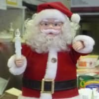 <p>A Santa Claus doll at The Harrison Deli. </p>