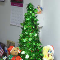 <p>A Christmas tree and stuffed animals set up for Christmas at the Harrison Municipal Building.</p>