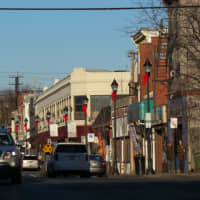 <p>Lamp posts in downtown Port Chester are decorated with ribbons. </p>