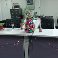 <p>A tree with holiday lights decorates the New Canaan Assessor&#x27;s Office. </p>