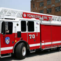 <p>An off-duty firefighter helped contain a blaze and may have saved the 27 Belmont Terrace home of former Yonkers City Councilman Dennis Robertson Saturday morning, firefighters said.</p>