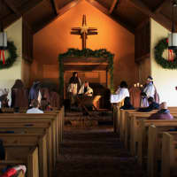 <p>Community volunteers dressed as shepherds, kings, angels, Mary and Joseph reenact the nativity inside the Eastchester Community Church.   </p>