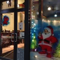 <p>Local store fronts bring holiday joy to passers by.</p>