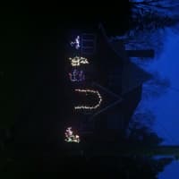 <p>Homes all around Bedford sparkle with holiday lights.</p>
