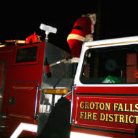 <p>Santa arrived at the North Salem tree lighting on a Croton Falls firetruck.</p>