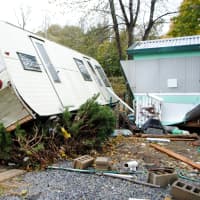 <p>A trailer thrown during the flooding on Riverview Avenue in Verplanck. </p>