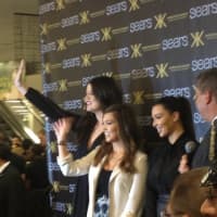 <p>Mayor Mike Spano introduces the Kardashian sisters earlier this year at the Cross County Shopping Center. </p>