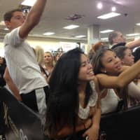 <p>Eager residents of all ages cheered for the Kardashian sisters at the Cross County Shopping Center in Yonkers.</p>