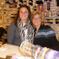 <p>Holiday business was good for Candy Nichols children&#x27;s clothing store and shop co-owner Anna Carberry, right. She is pictured with sales associate Jennifer Joseph. </p>