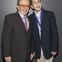 <p>Eastchester student Paul Evangelista poses with ASCAP Foundation President Paul Williams.</p>