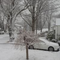 <p>Snow falls in Hawthorne on Saturday.</p>