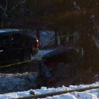 <p>The car was pushed along the tracks several hundred feet after the train hit it from the side, police said.</p>