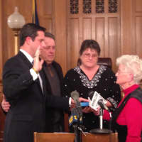 <p>New York state Sen. Gregory R. Ball was sworn in by former Mount Kisco Mayor Pat Reilly.</p>