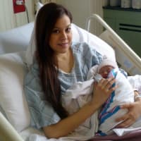 <p>Claudia Ceja of Port Chester delivered her daughter, Emiliana Lopez, at 7:04 a.m. Tuesday inside Phelps Memorial Hospital, the first baby of 2013 to be born at the hospital. </p>