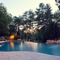 <p>The award-winning pool at at the Gray Goose Pond Retreat features an infinity edge and hillside rock garden.</p>