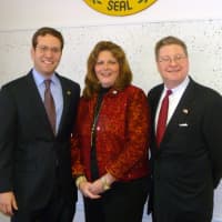<p>Donohue, center, poses with state Assembly member David Buchwald, left, and County Legislator Dan Harckham, right, as her swearing-in ceremony.</p>