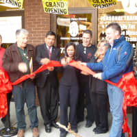 <p>Town Board members Nick Bianco, Vishnu Patel and Terrence Murphy joined owner Jeanette Fischetto for the grand opening of Dynamic Pulse.</p>