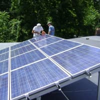 <p>Photovoltaic panels like these would go onto town-owned buildings if Fairfield&#x27;s microgrid project gets approval from the state.</p>