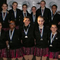 <p>Shadows from the Southern Connecticut Synchronized Skating Club show their pewter medals.</p>