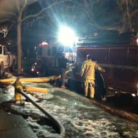 <p>Firefighters from the Mount Kisco Fire Department assist at the blaze in a  Bedford Hills home Tuesday night.</p>