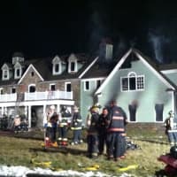 <p>The Bedford Hills home was fully involved when fire crews arrived, fire officials said.</p>
