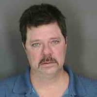 <p>Michael Smith, 47, of Cortlandt was arrested at 8:45 a.m. Monday, Jan. 7, and charged with possession of a forged instrument, a class D felony, Peekskill police said.</p>