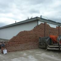 <p>A brick wall between Joeys&#x27; by the Shore and the pavilion at Compo Beach was knocked down by the force of the waves during Hurricane Sandy in October.</p>