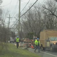<p>Emergency responders at the scene of water main breaks Friday in New Rochelle. </p>