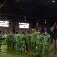 <p>Soldiers receive medals from their commanding officers.</p>