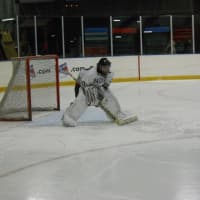 <p>Scarsdale goalie Ian Marinelli made 34 saves in a 3-2 loss to Mamaroneck Monday in a Section 1 hockey game.</p>