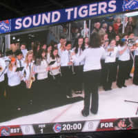 <p>The Port Chester Middle School Band performs &quot;The Star-Spangled Banner&quot; at a Bridgeport Sound Tigers game Saturday. </p>