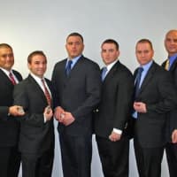 <p>Officer Kenneth Cerulli, second from the right next to Norwalk Mayor Richard Moccia, was one of six officers hired in February 2011.</p>