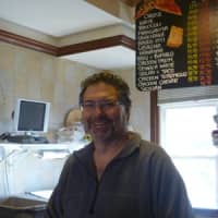 <p>Slices Pizza owner Isaac Garson welcomes blood donors to his annual drive.</p>